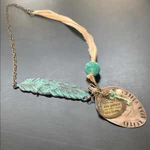 One of a kind necklace. “Spread your wings”